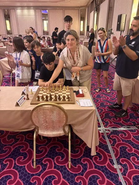 Mebşure Taşkın at board one with Kagan Torun after the ceremonial first move
